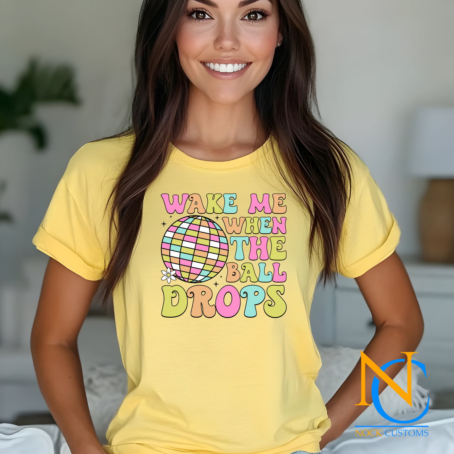 2025 Wake Me When the Ball Drops DTF transfer print design on apparel, featuring pastel colors and a retro disco ball.