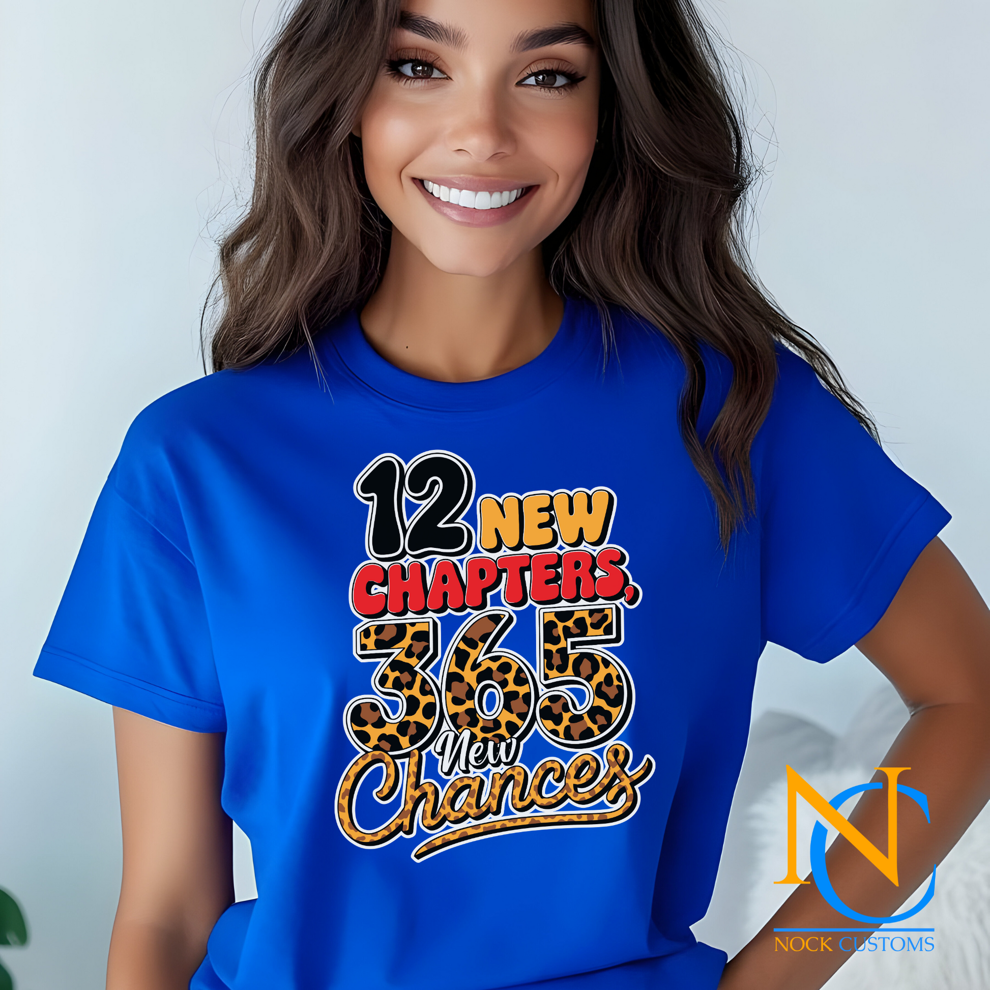 DTF transfer print with '12 New Chapters, 365 New Chances' design featuring bold lettering with a leopard print detail for t-shirts.