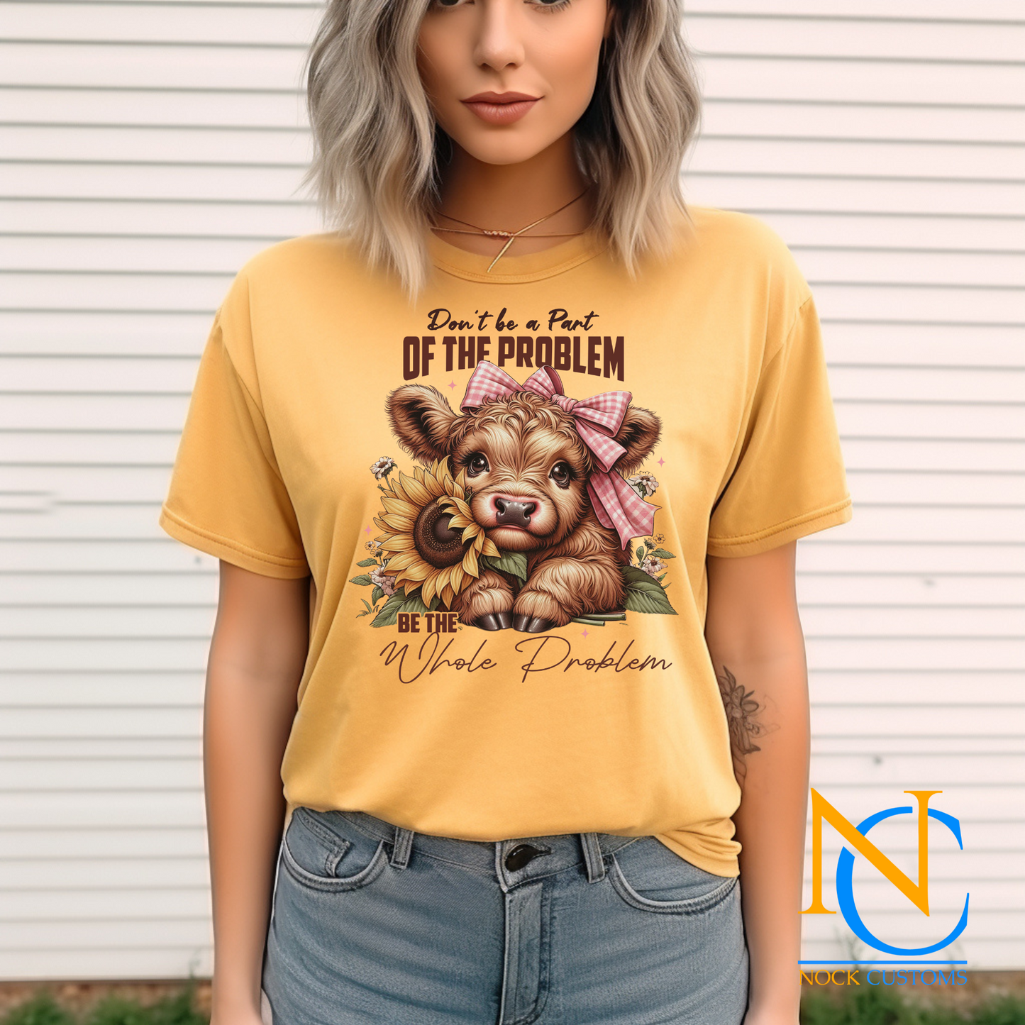 An adorable design featuring a baby cow with a pink gingham bow, holding a vibrant sunflower, surrounded by floral accents and the text 'Don't Be a Part of the Problem, Be the Whole Problem.' Perfect for direct-to-film (DTF) transfers with a playful and charming vibe.