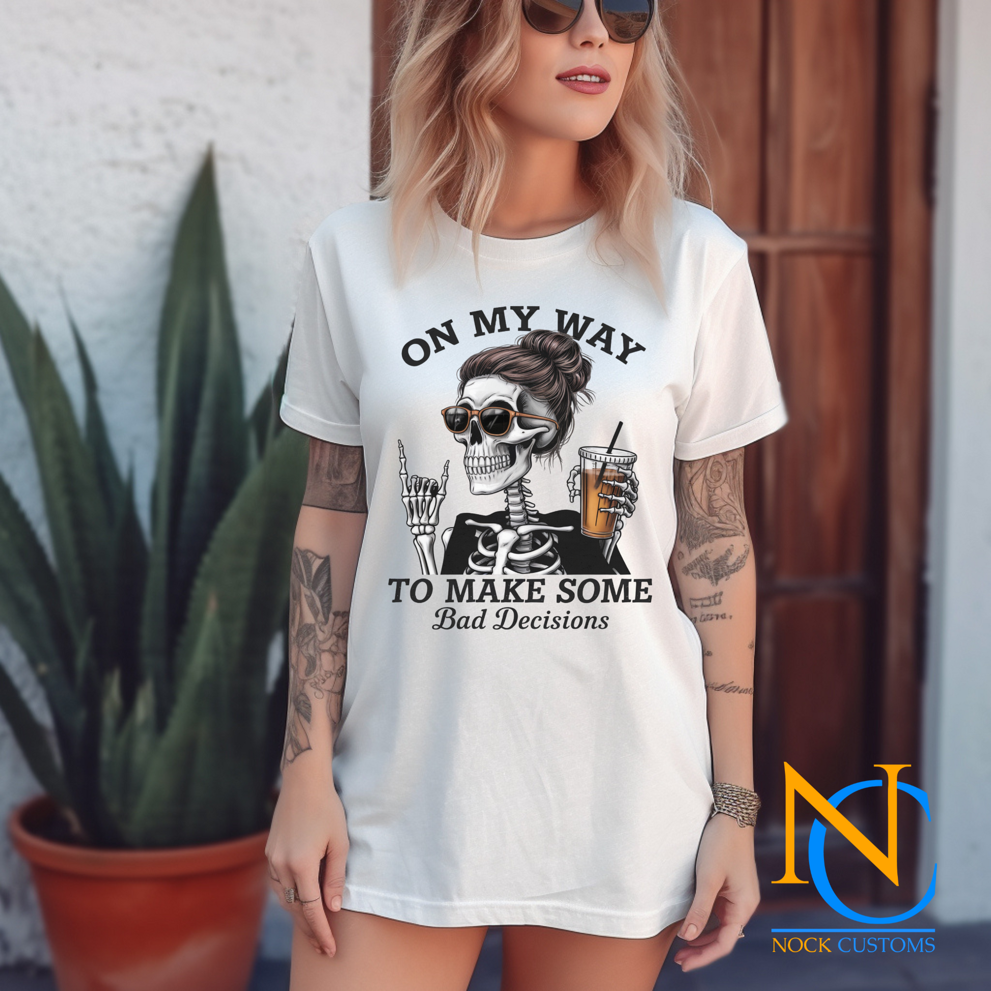 A fun and edgy design featuring a skeleton with a messy bun and sunglasses, holding an iced coffee, accompanied by the text 'On My Way to Make Some Bad Decisions.' Perfect for direct-to-film (DTF) transfers with a humorous and sassy vibe.