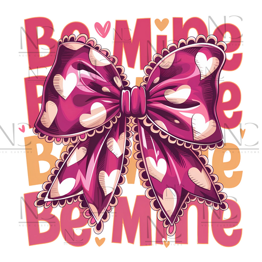 A charming Valentine-themed design featuring a pink bow adorned with white hearts, surrounded by the phrase 'Be Mine' in bold pink and peach letters. Ideal for direct-to-film (DTF) transfers on various materials.