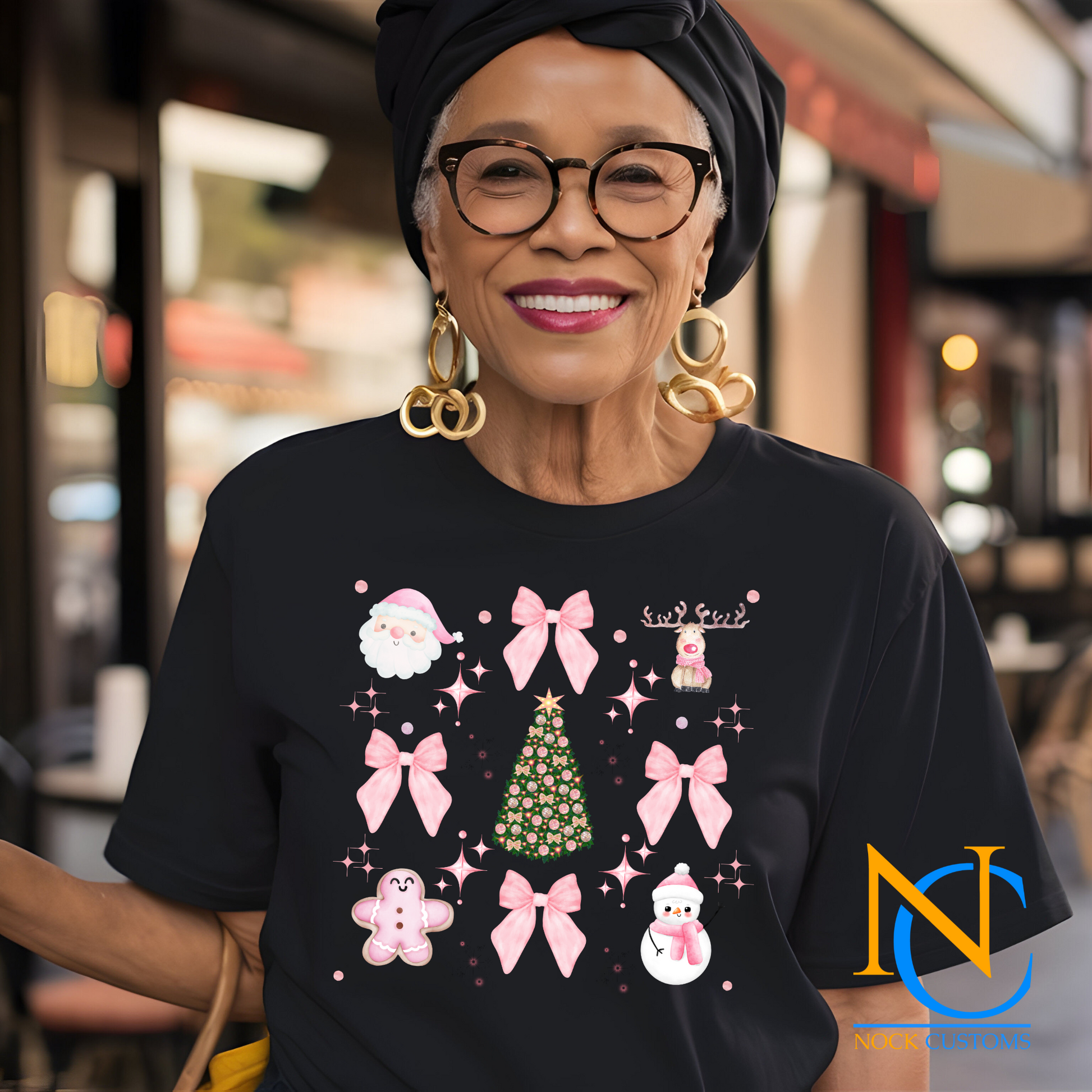 Festive pink-themed Christmas DTF transfer with bows, snowmen, gingerbread, and holiday tree designs for apparel decoration.