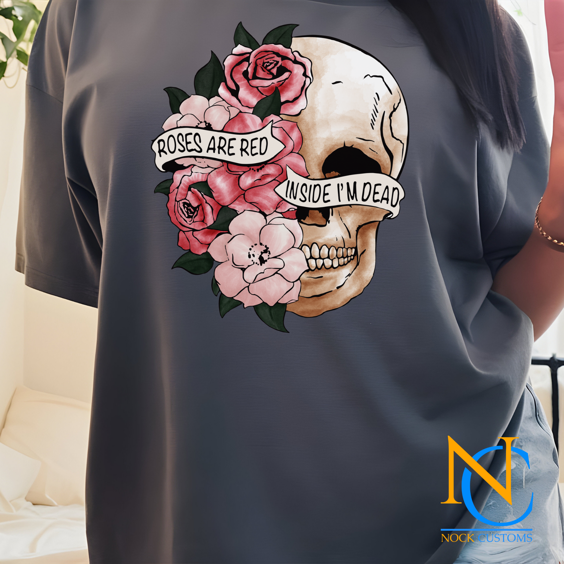 A bold design featuring a skull adorned with pink roses and green leaves, overlaid with banners that read 'Roses Are Red, Inside I’m Dead.' Perfect for direct-to-film (DTF) transfers with an edgy and artistic vibe.