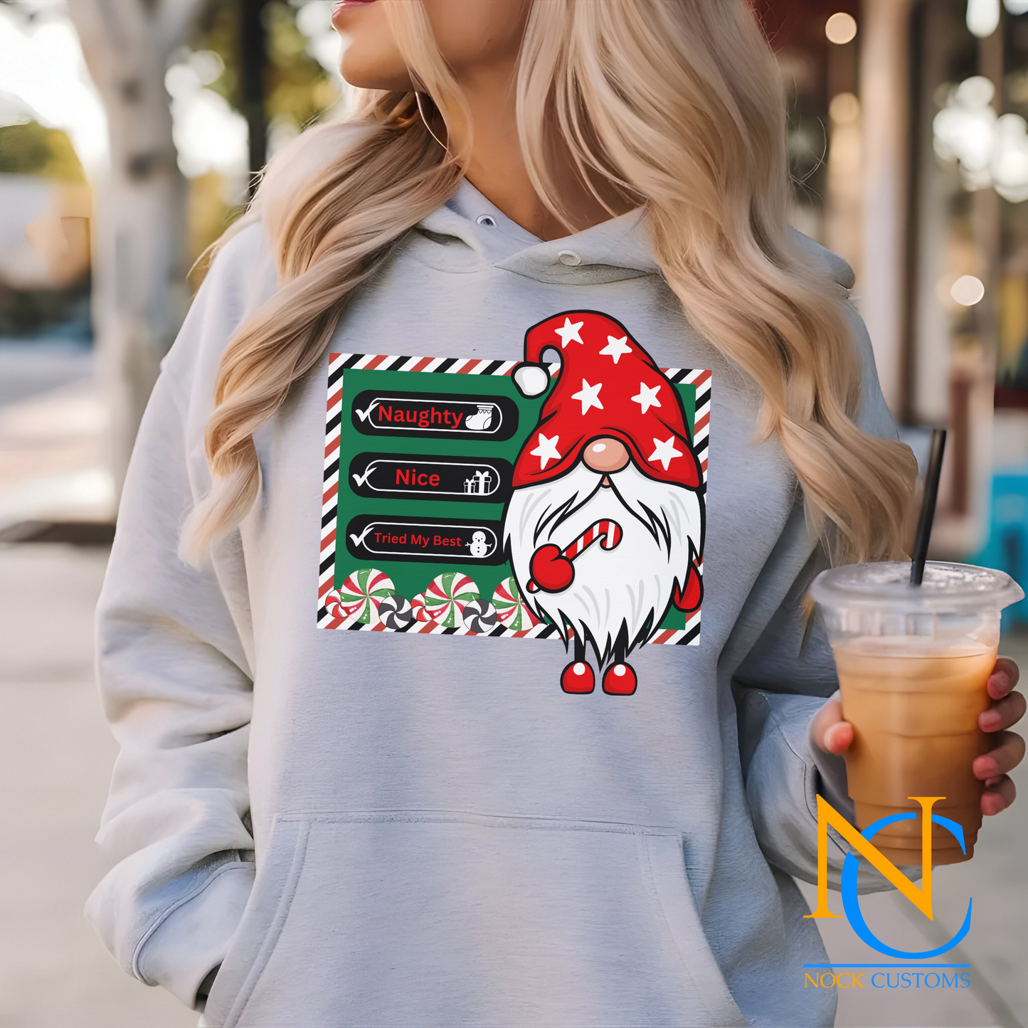 Festive gnome-themed DTF transfer design featuring a holiday checklist and candy cane, perfect for creating unique Christmas sweatshirts, hoodies, and apparel.