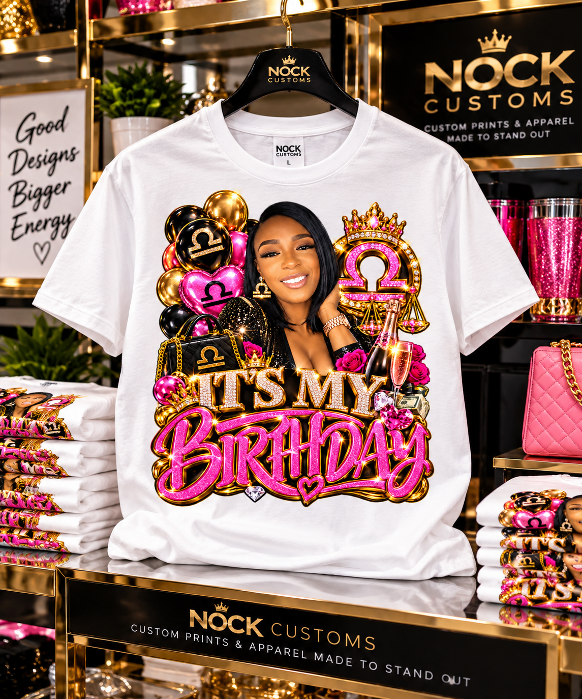White NOCK Customs Libra birthday T-shirt on a hanger with portrait artwork and pink-and-gold “It’s My Birthday” lettering.