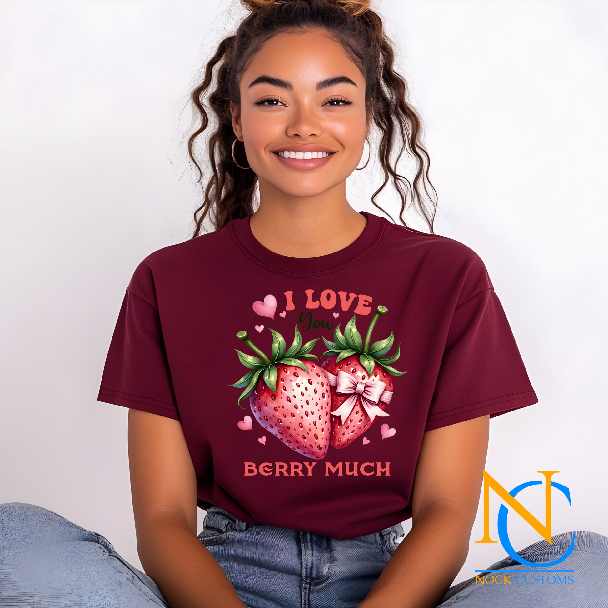 A delightful design featuring two strawberries, one adorned with a pink bow, surrounded by the text 'I Love You Berry Much' and small pink hearts. Perfect for direct-to-film (DTF) transfers for romantic or fun projects.