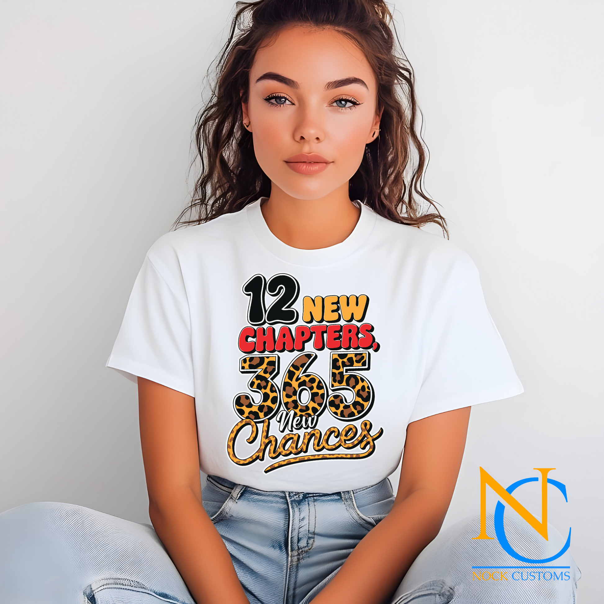 DTF transfer print with '12 New Chapters, 365 New Chances' design featuring bold lettering with a leopard print detail for t-shirts.