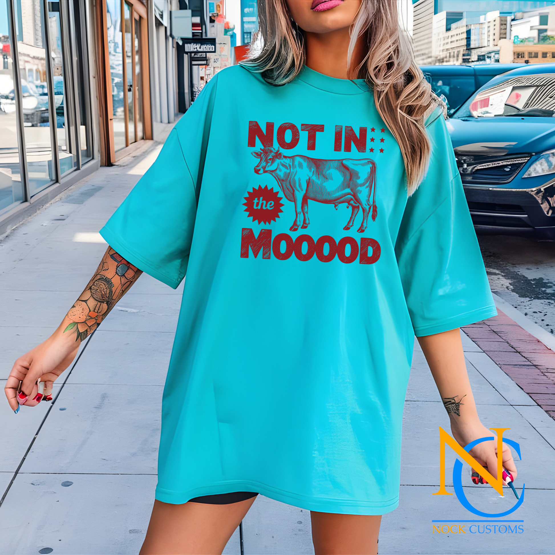 A humorous design featuring a red silhouette of a cow with bold text reading 'Not in the Mooood,' accented by star details. Perfect for direct-to-film (DTF) transfers with a playful and sarcastic vibe.