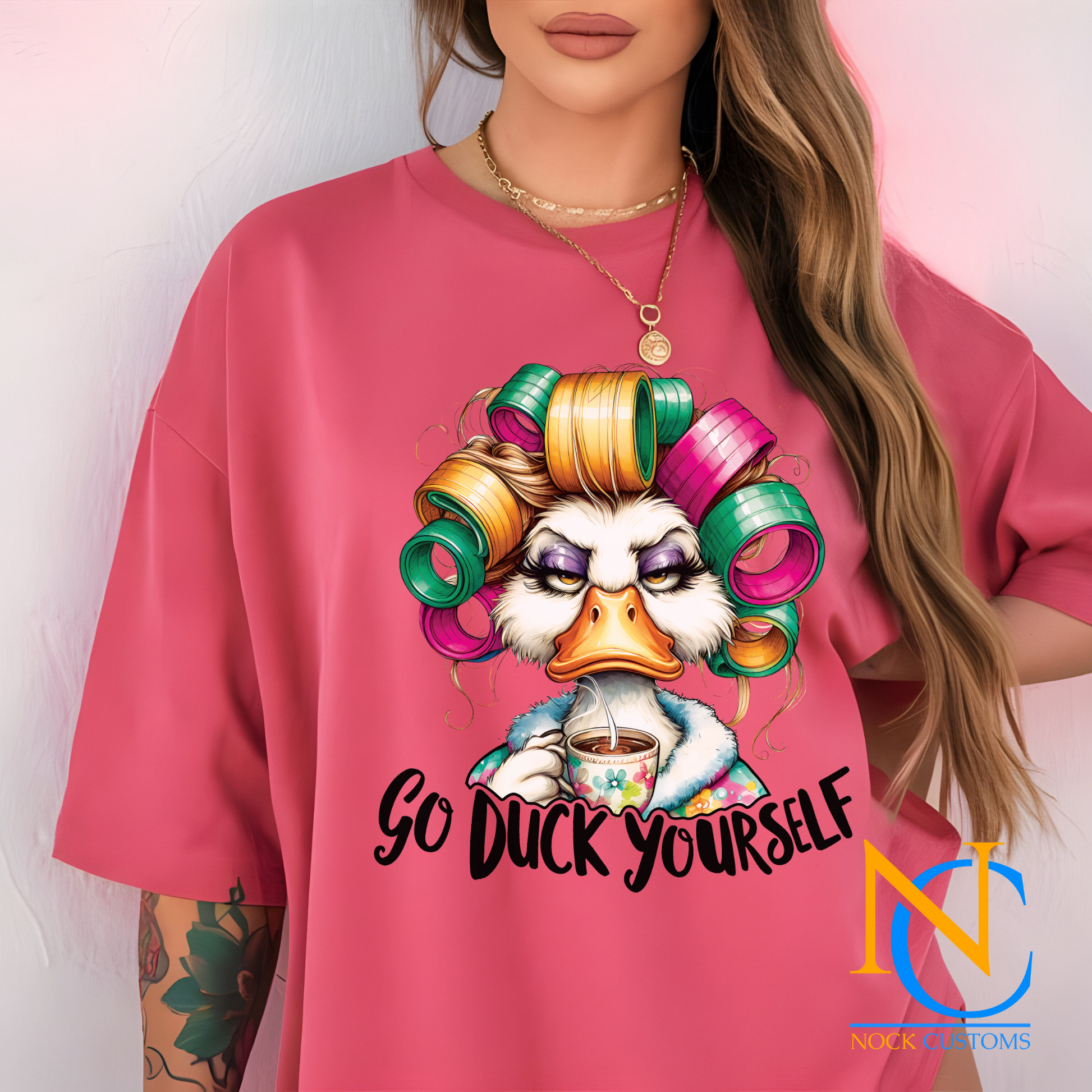 A humorous and sassy design featuring a duck with colorful hair rollers, a tired expression, holding a coffee cup, with the text 'Go Duck Yourself.' Perfect for direct-to-film (DTF) transfers with a bold and funny vibe.