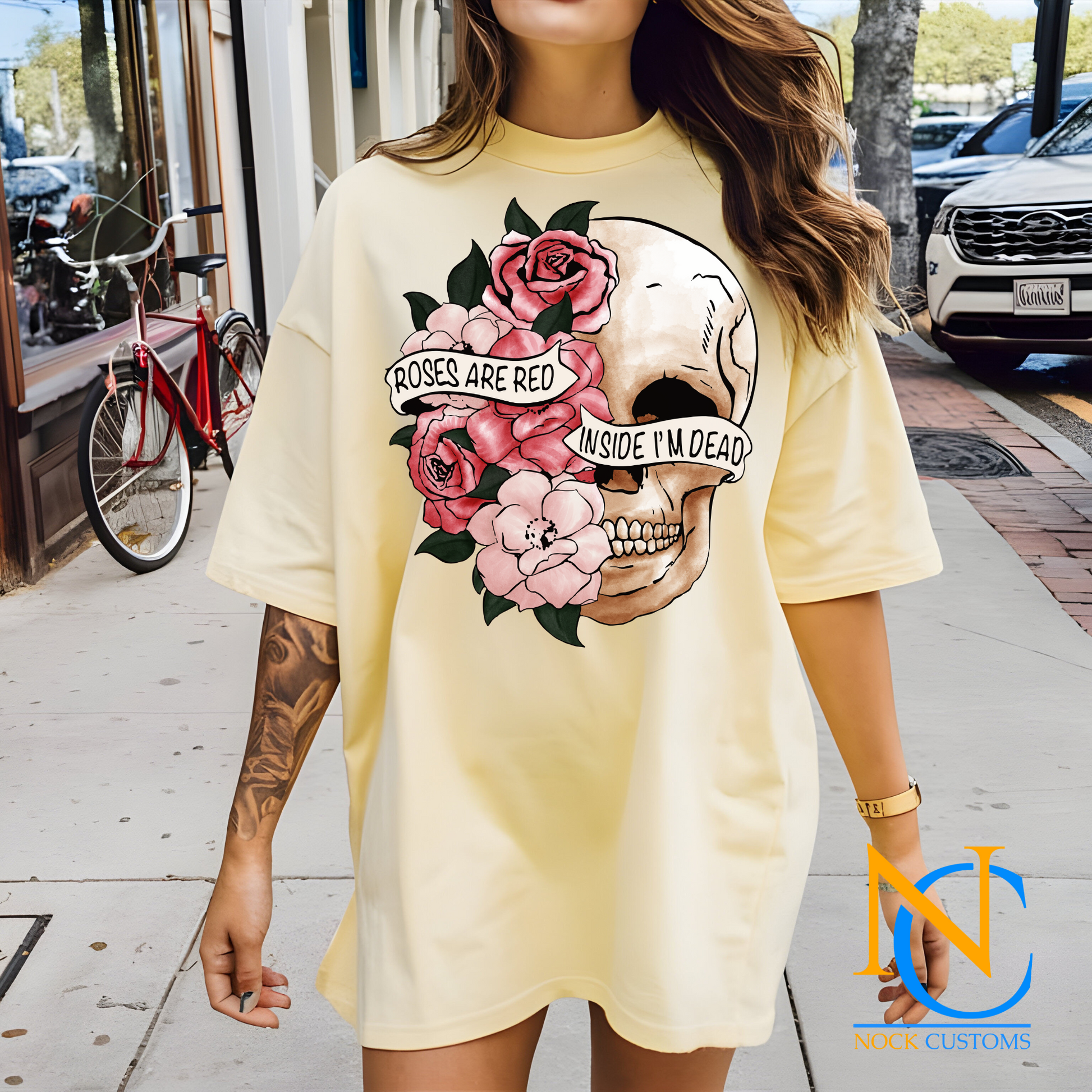 A bold design featuring a skull adorned with pink roses and green leaves, overlaid with banners that read 'Roses Are Red, Inside I’m Dead.' Perfect for direct-to-film (DTF) transfers with an edgy and artistic vibe.