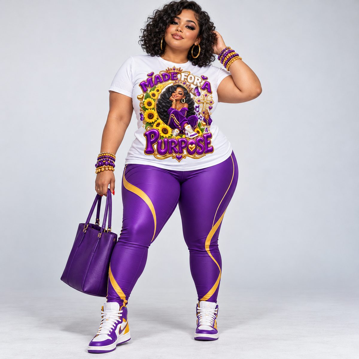 Model wearing the white Made for a Purpose graphic tee with purple and gold artwork.